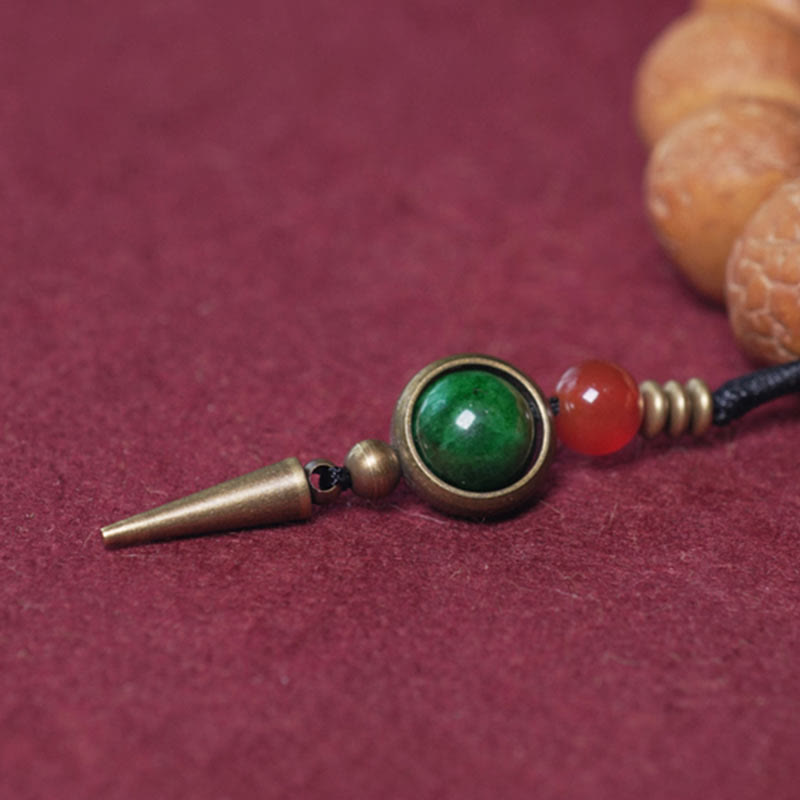Bracelet Mala Bodhi 14 mm et Perles Dzi Artisanales La force symbolique des graines sacrées