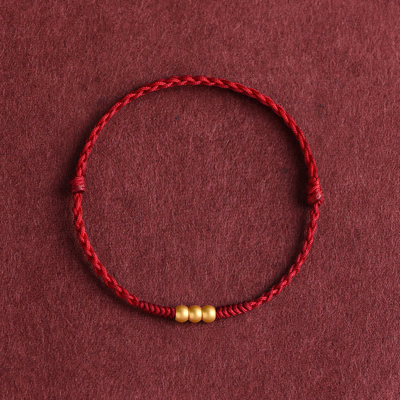 Mini-Bracelet Fil Rouge en Or 999 avec Trois Perles Porte-Bonheur