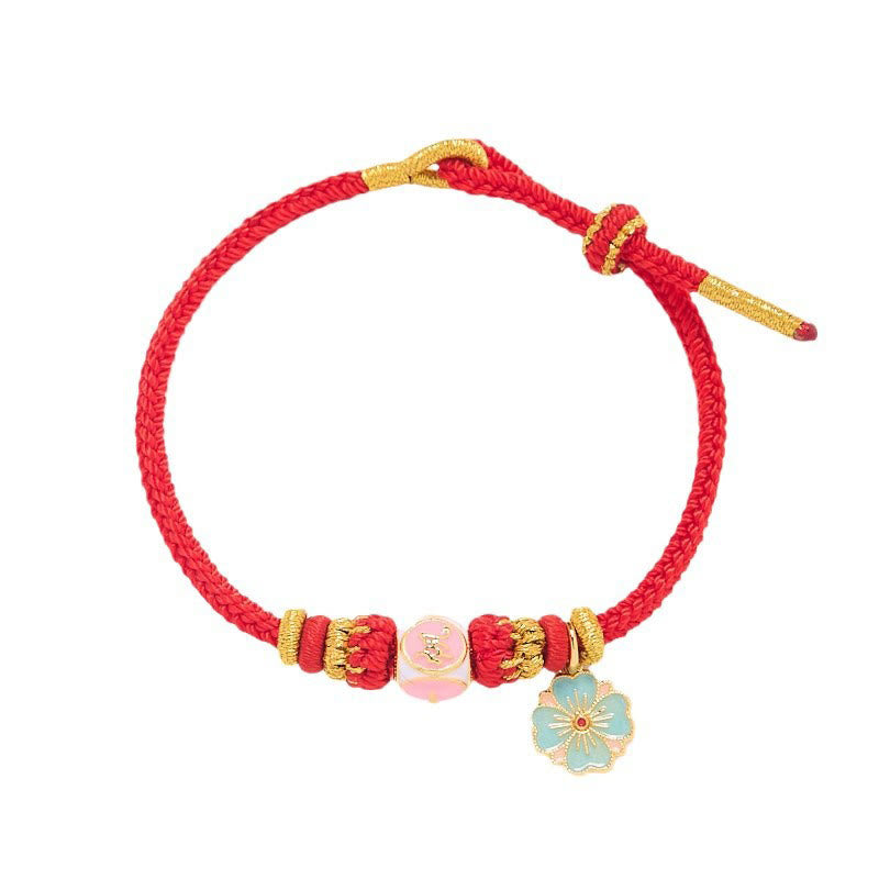 Bracelet de Protection Fleur de Pêcher en Cuivre Plaqué Or & Fil Rouge