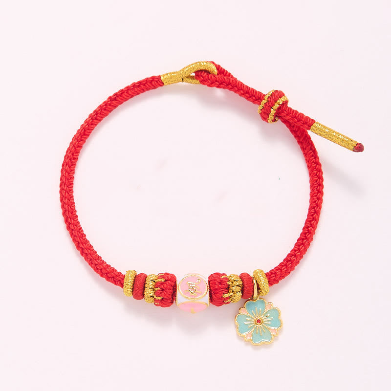 Bracelet de Protection Fleur de Pêcher en Cuivre Plaqué Or & Fil Rouge
