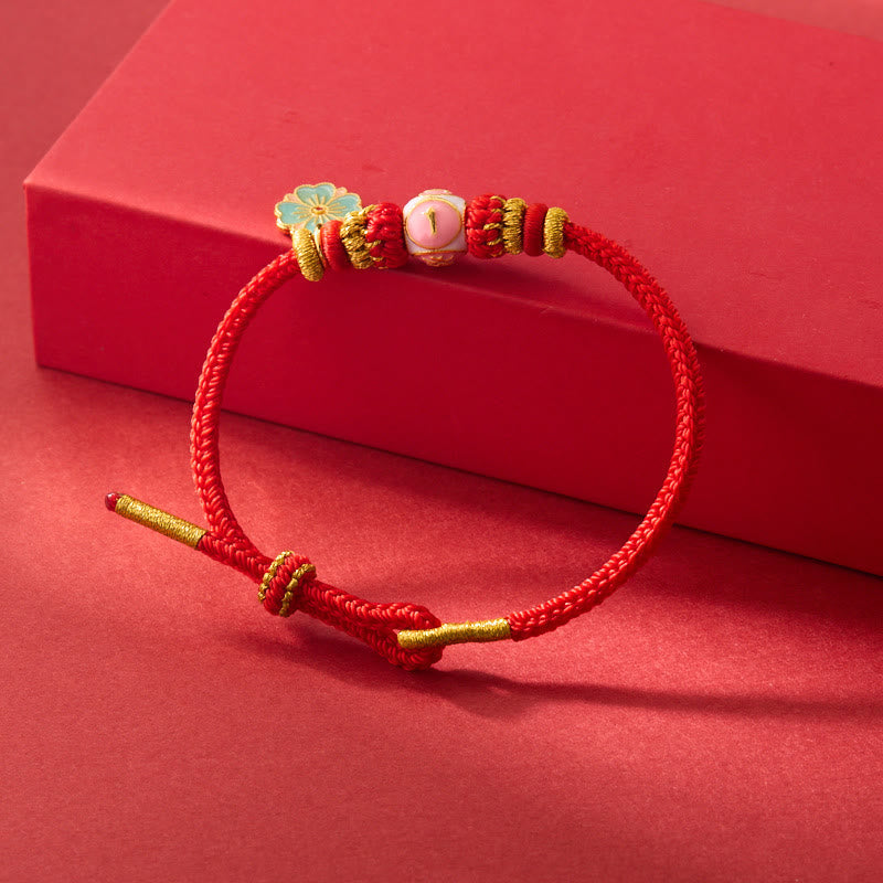 Bracelet de Protection Fleur de Pêcher en Cuivre Plaqué Or & Fil Rouge