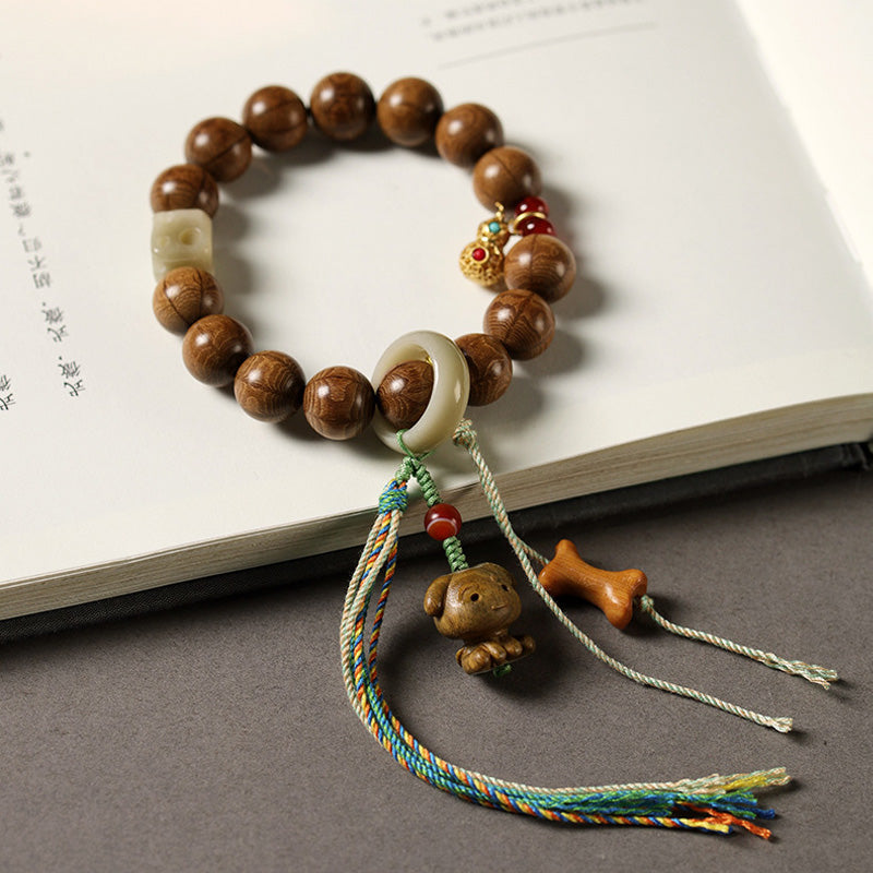 Bracelet Six Voies en Bois Ancien – Perles Sculptées ~12 mm & Éléments Naturels