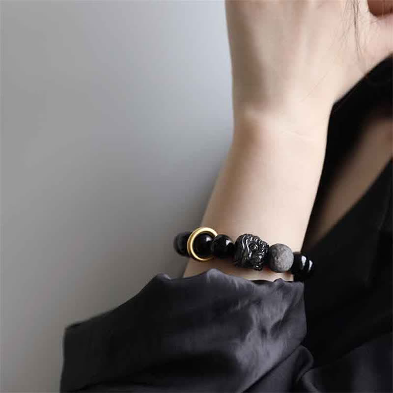 Bracelet Force du Lion en Obsidienne Noire & Argentée – Perles 12 mm