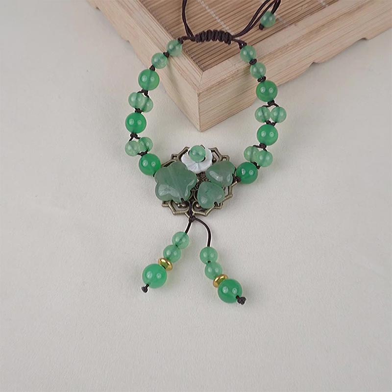 Bracelet Porte-Bonheur en Jade Vert & Fleur Symbolique | Harmonie & Épanouissement