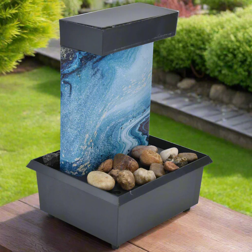 Petite Fontaine Japonaise à Galets – Sérénité, Lumière et Harmonie