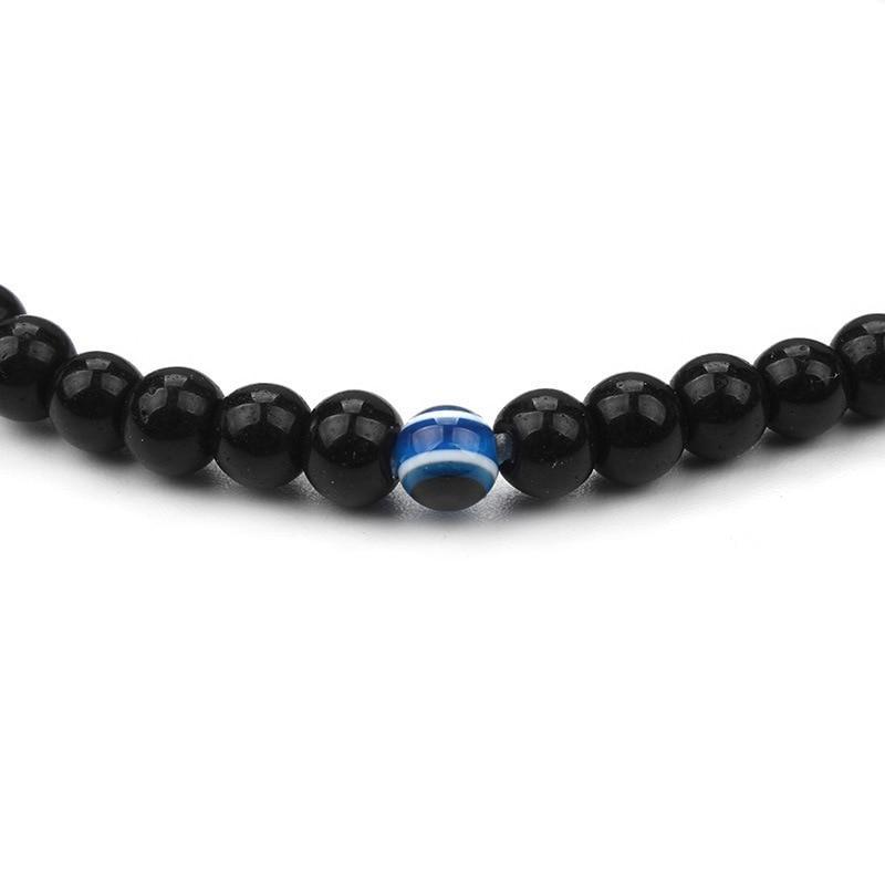 Bracelet en Onyx Noir & Symbole du Mauvais Œil (Perles 4 mm)
