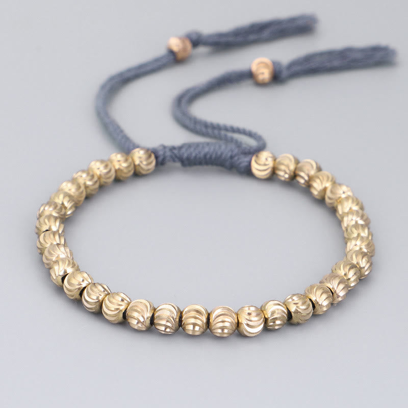 Bracelet Spirituel Tibétain en Perles de Cuivre Ajustable