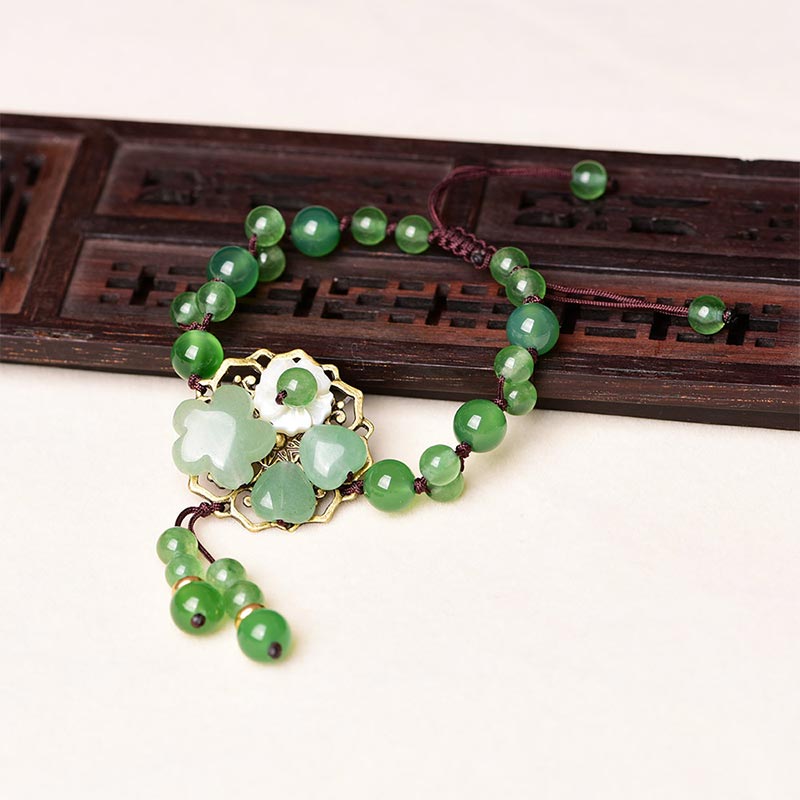 Bracelet Porte-Bonheur en Jade Vert & Fleur Symbolique | Harmonie & Épanouissement