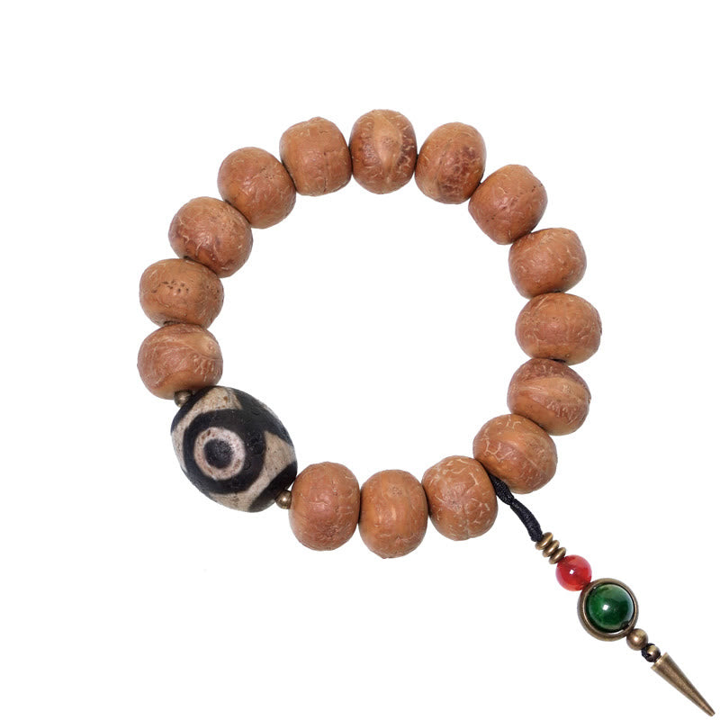 Bracelet Mala Bodhi 14 mm et Perles Dzi Artisanales La force symbolique des graines sacrées