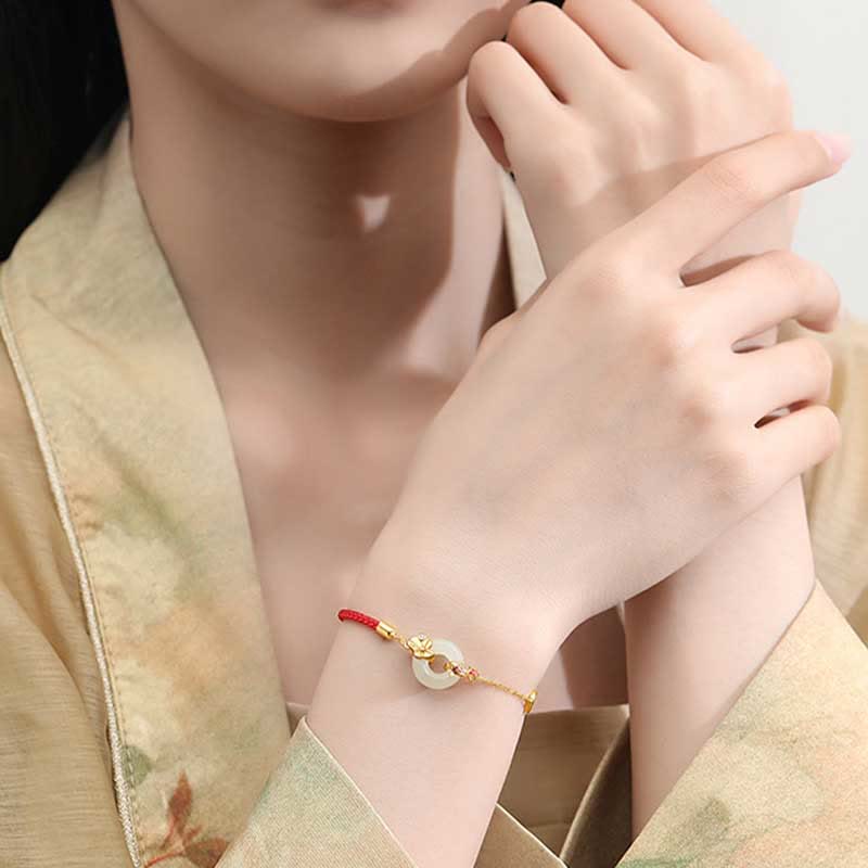 Bracelet en Jade Hetian & Cordon Rouge – Symbole de Paix et d’Harmonie – Perle 12 mm