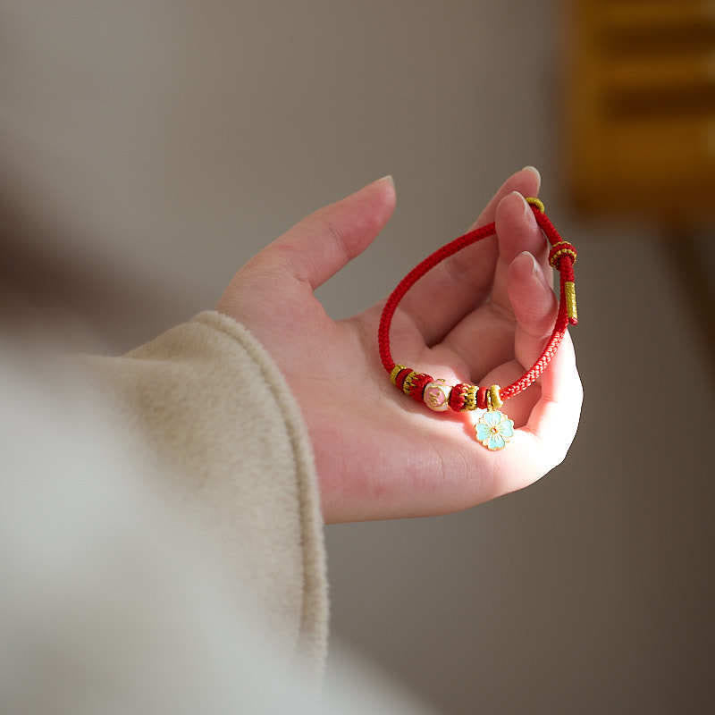 Bracelet de Protection Fleur de Pêcher en Cuivre Plaqué Or & Fil Rouge