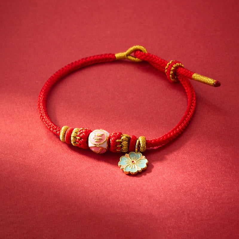 Bracelet de Protection Fleur de Pêcher en Cuivre Plaqué Or & Fil Rouge
