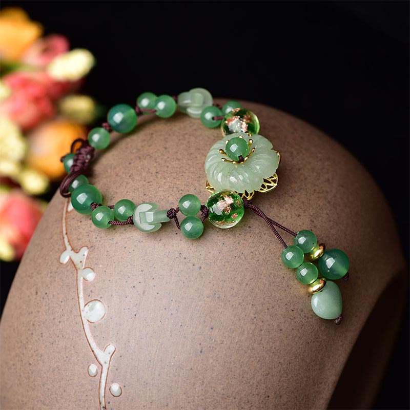 Bracelet Porte-Bonheur en Jade Vert & Fleur Symbolique | Harmonie & Épanouissement