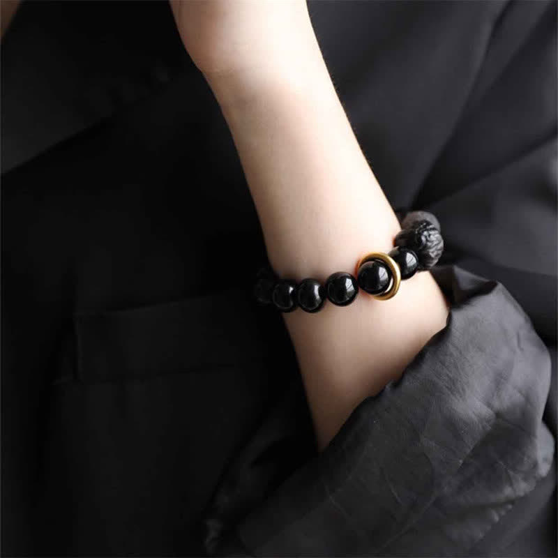 Bracelet Force du Lion en Obsidienne Noire & Argentée – Perles 12 mm