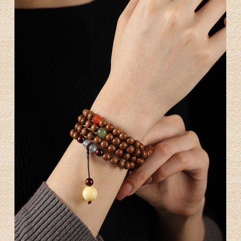 Bracelet Mala en Bois de Santal Ancien – Symboles Sacrés & Pierres Naturelles