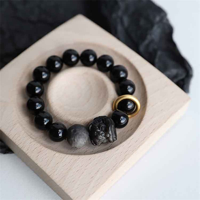 Bracelet Force du Lion en Obsidienne Noire & Argentée – Perles 12 mm