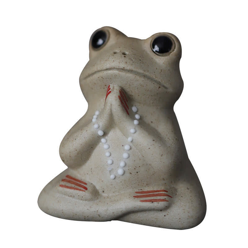 Statue de petite grenouille en céramique en méditation