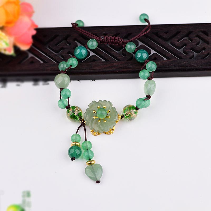 Bracelet Porte-Bonheur en Jade Vert & Fleur Symbolique | Harmonie & Épanouissement