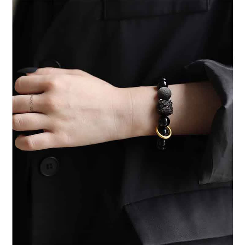 Bracelet Force du Lion en Obsidienne Noire & Argentée – Perles 12 mm