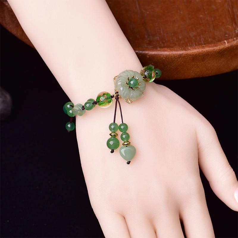 Bracelet Porte-Bonheur en Jade Vert & Fleur Symbolique | Harmonie & Épanouissement