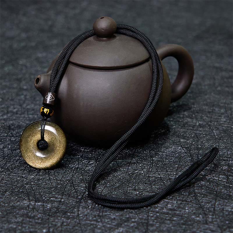 Collier Boucle de Paix en Obsidienne Dorée Naturelle